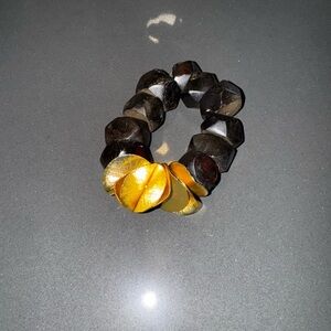 Elegant Gold and Black Bracelet